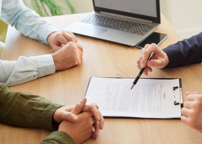 clients consulting with attorney
