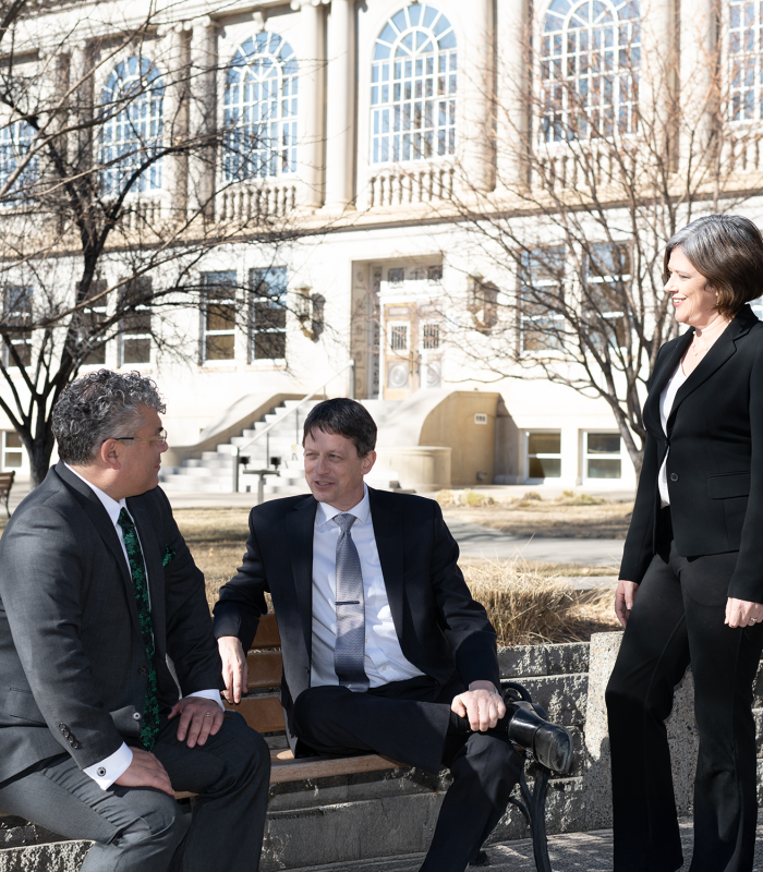 Luna Law team outside talking.