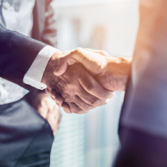 two business people shaking hands