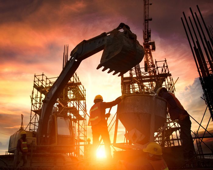 A construction site with workers and equipment.