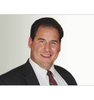 Attorney Brad Weil smiling