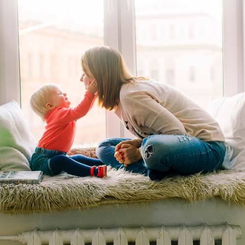 Mother playing with a child