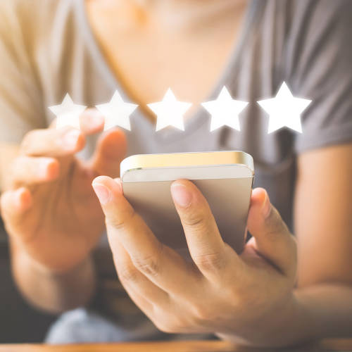 Woman leaving a review on the phone
