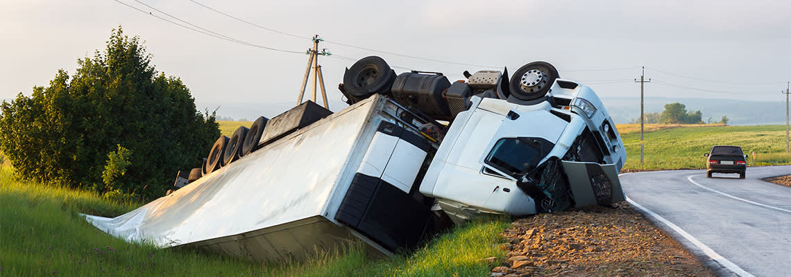 Truck turned sideways after accident on highway