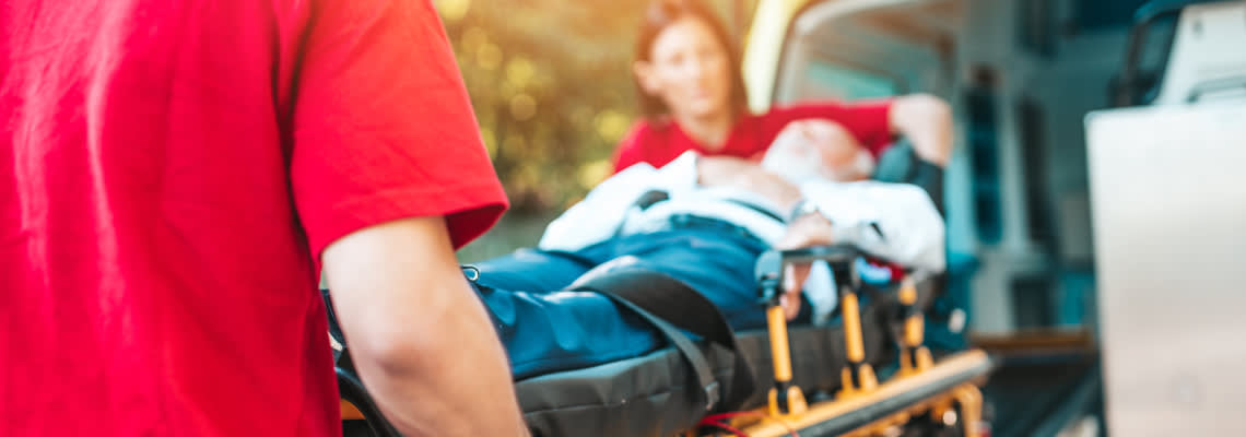 Injured man being helped by paramedics