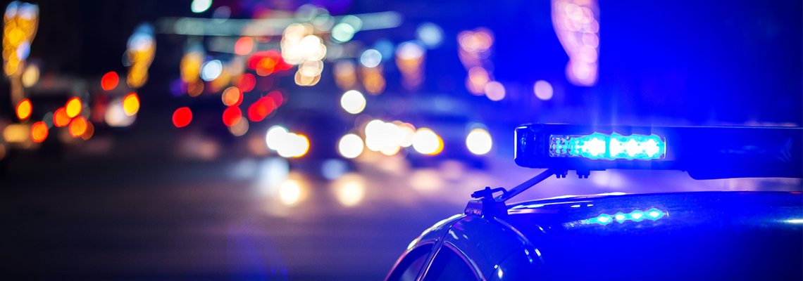 night police car lights in city