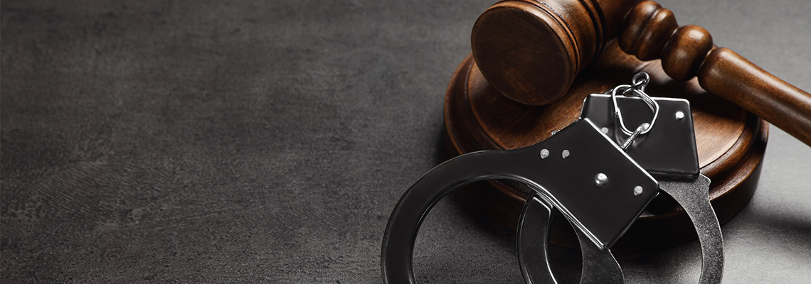 Judge's gavel and handcuffs