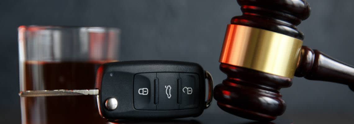 Gavel, Car Keys and Galss of Alcohol