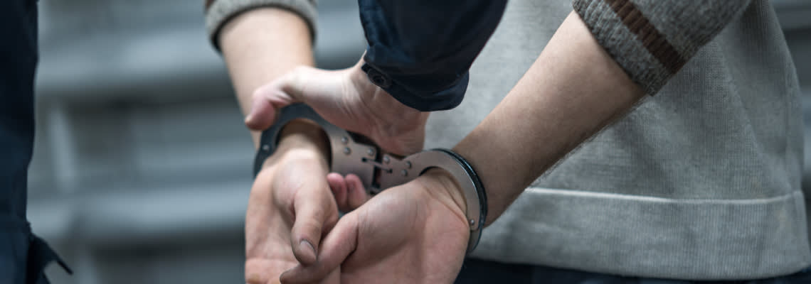 Police handcuffing a man