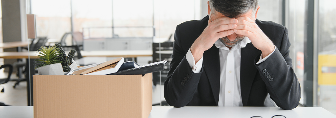 Old office employee in relocation concept