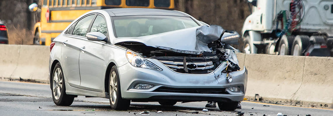Crashed car on highway