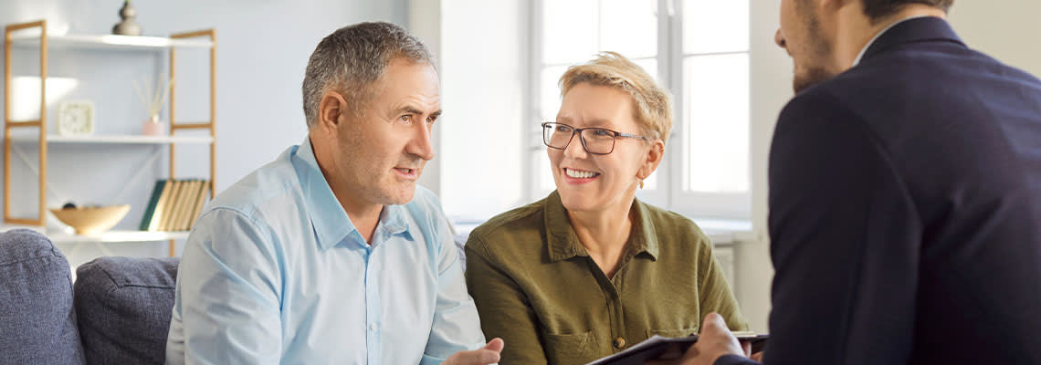 Couples consulting with attorney for estate planning