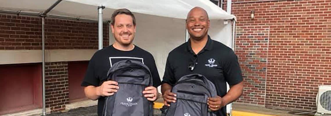 Attorney Frank Walker and Pastor Brandon with Backpacks
