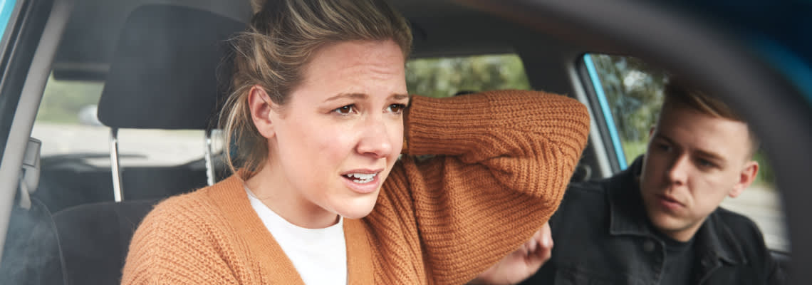 Injured female passenger after a car accident