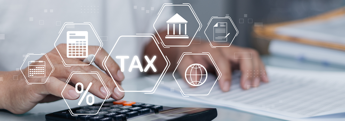 Finance or income concept. calculating taxes online
