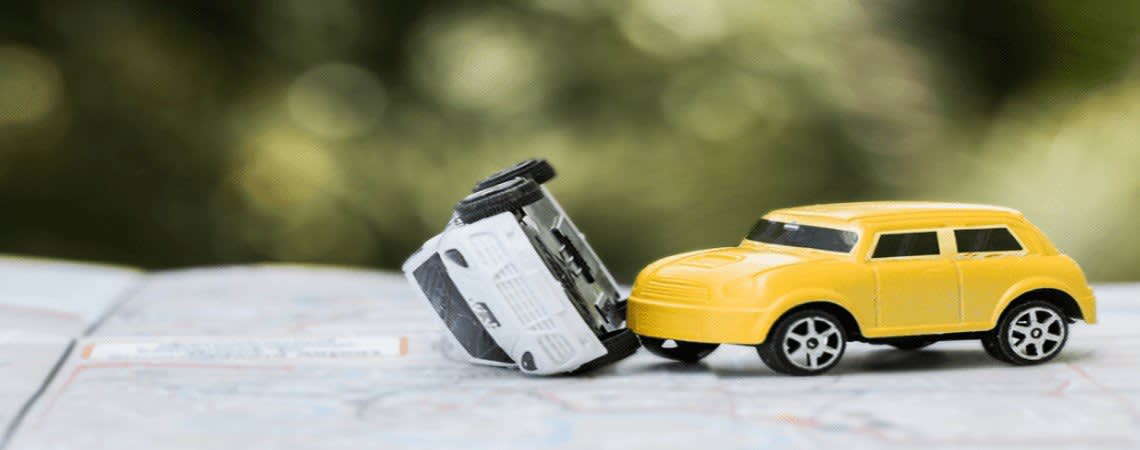 Two toy cars in an accident