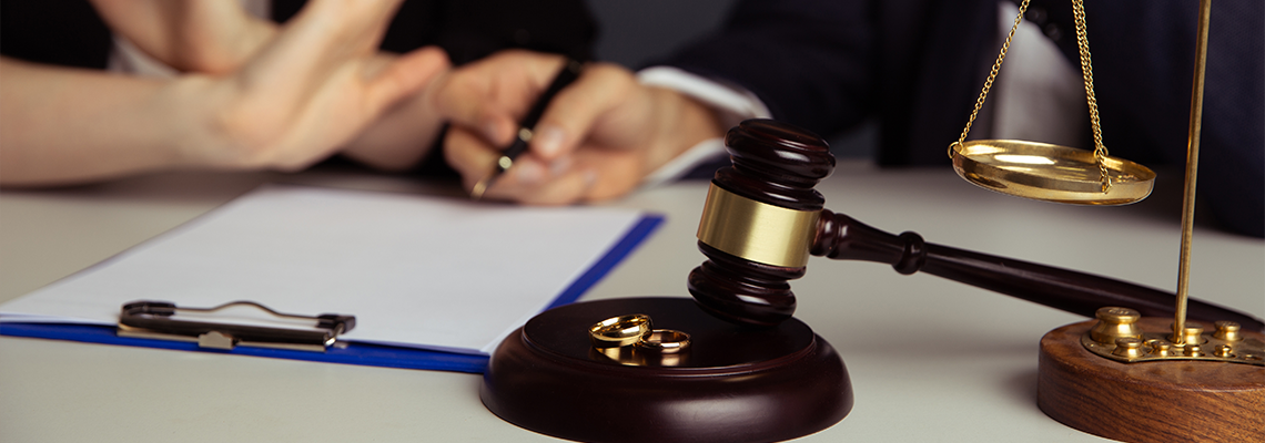 Judge gavel deciding on marriage divorce