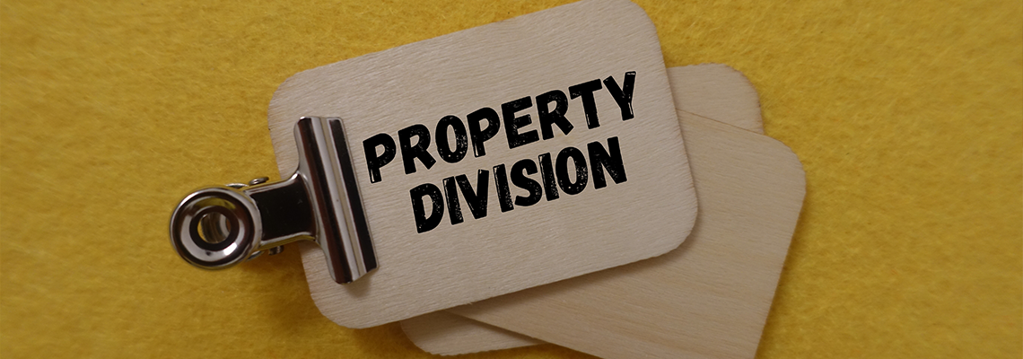 Property division label held by office clip