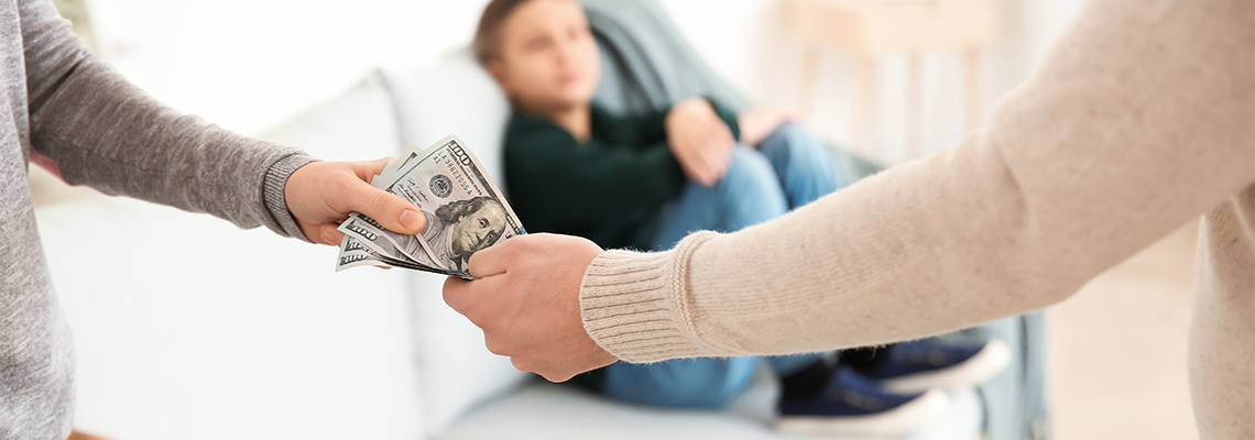 Man giving alimony to his ex-wife at home