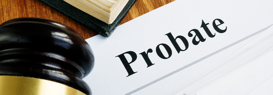 Probate sign, stack of papers and gavel