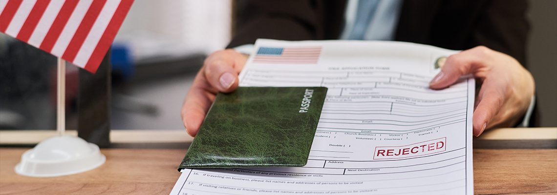 Caucasian middle aged woman handing over passport and visa application