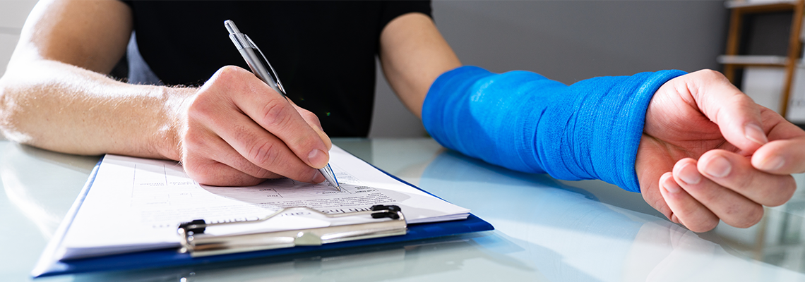 Worker Filling Accident And Disability Compensation Form