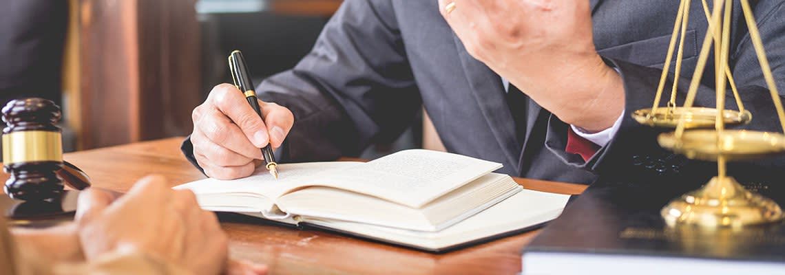 Attorney working with client
