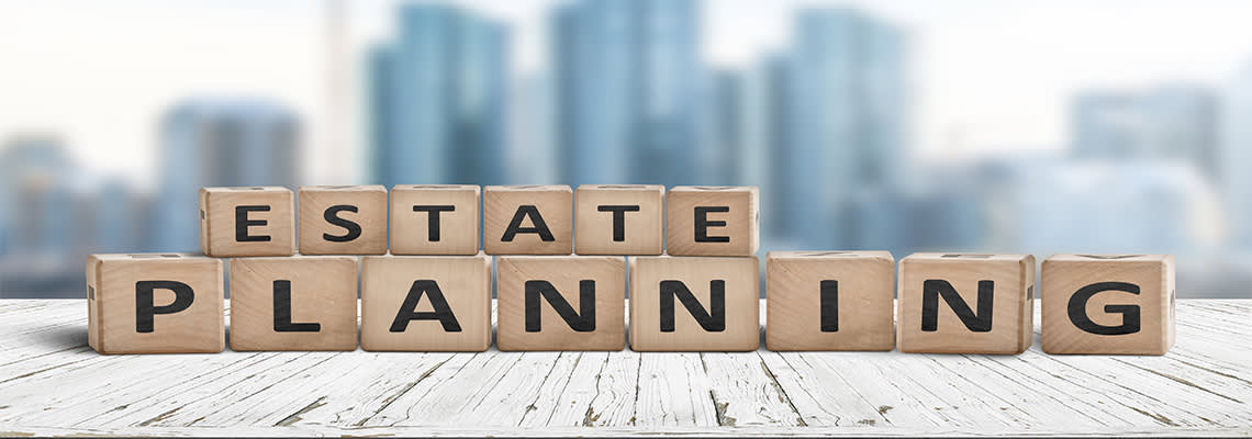 Estate planning sign on a wooden pier