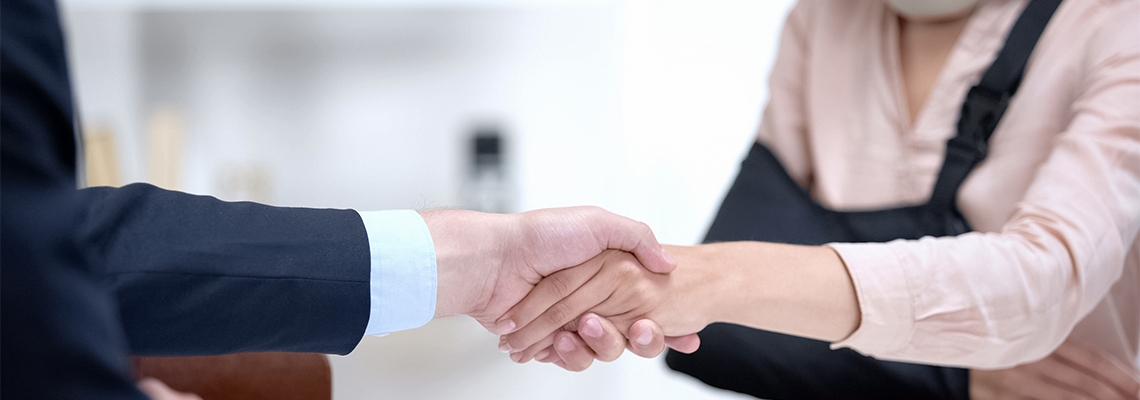 Two people shaking hands