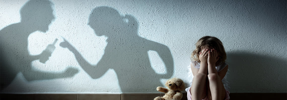 Child Crying With Shadow Of Adults Arguing