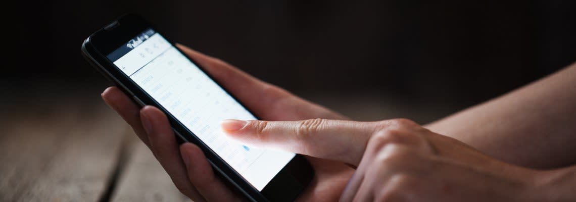 Person holding a smart phone