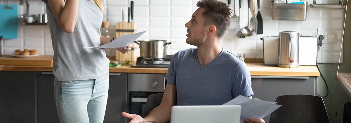 A couple stresses over their money problems