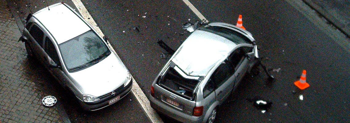 Bird's eye view of a car accident marked off with traffic cones