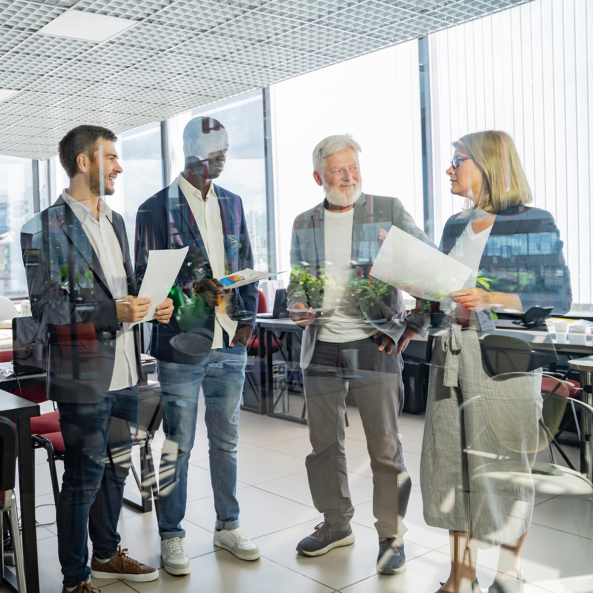 Group of business people in office.