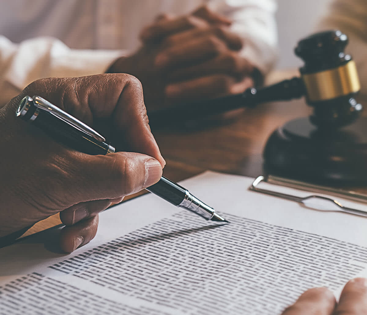 Attorney reviewing documents with client