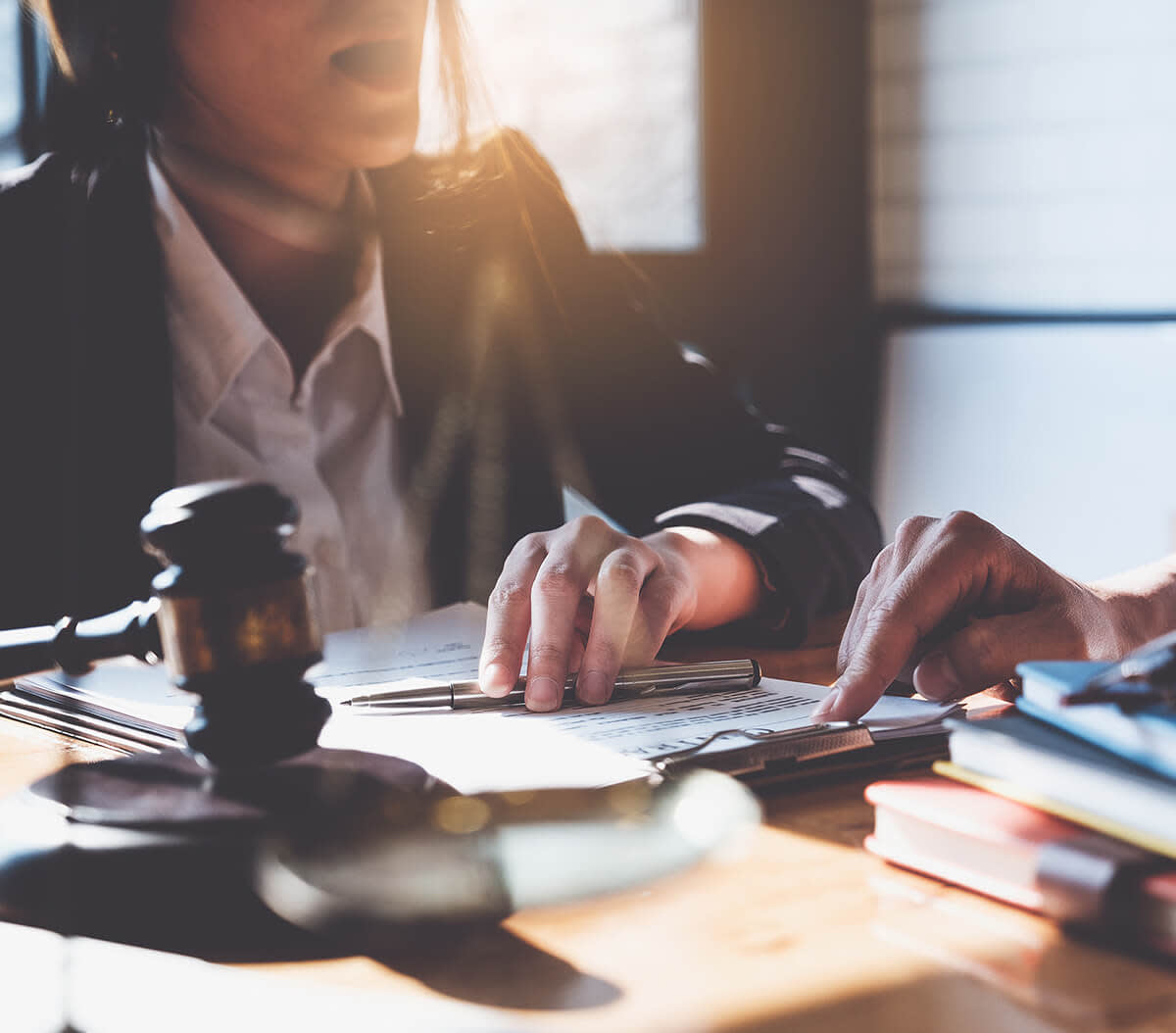 Female attorney discussing something with client