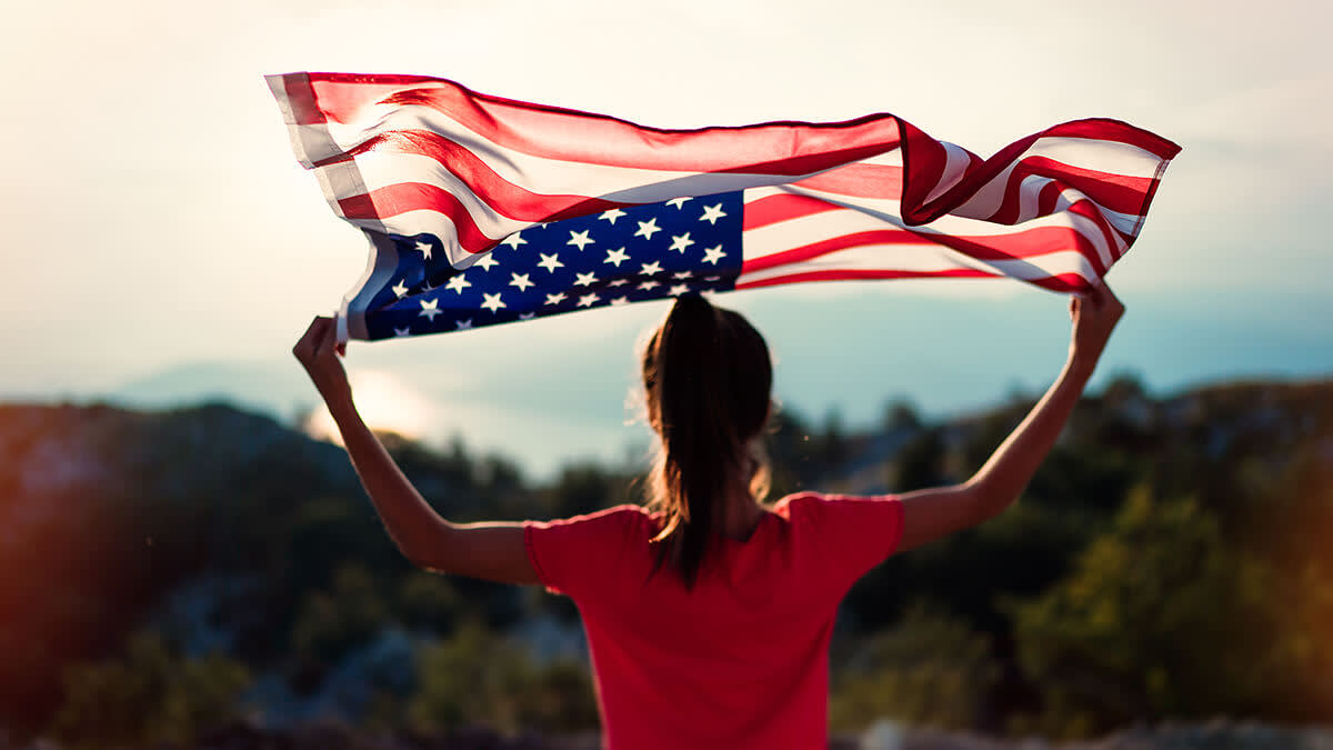 Girl holding an American flag