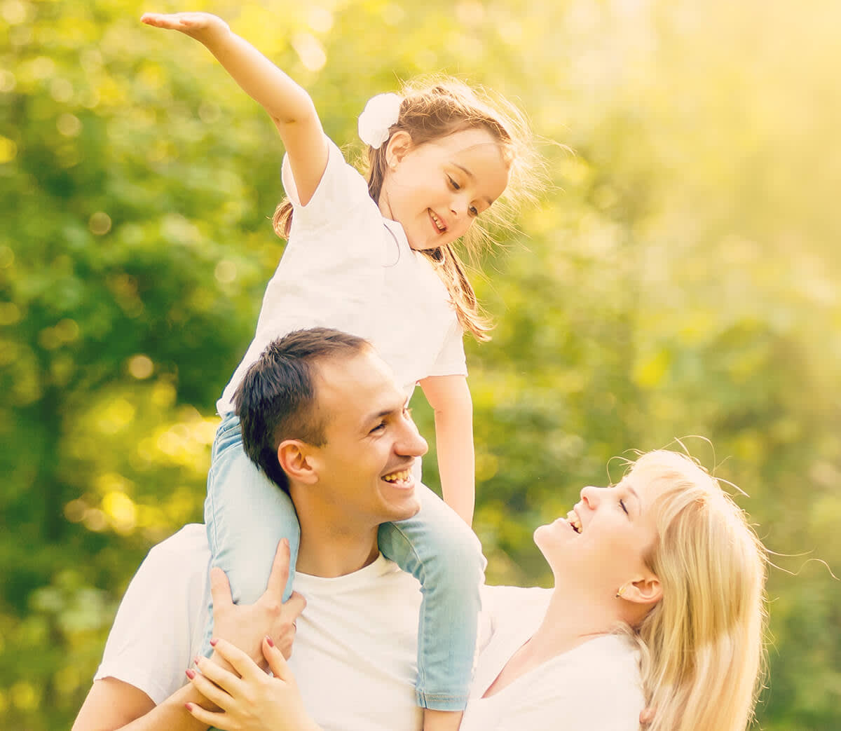 Family having fun together in a field