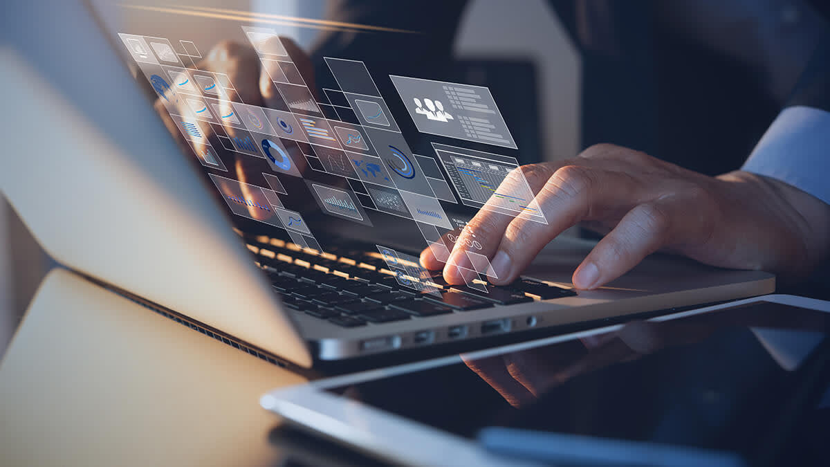 Businessman typing at computer