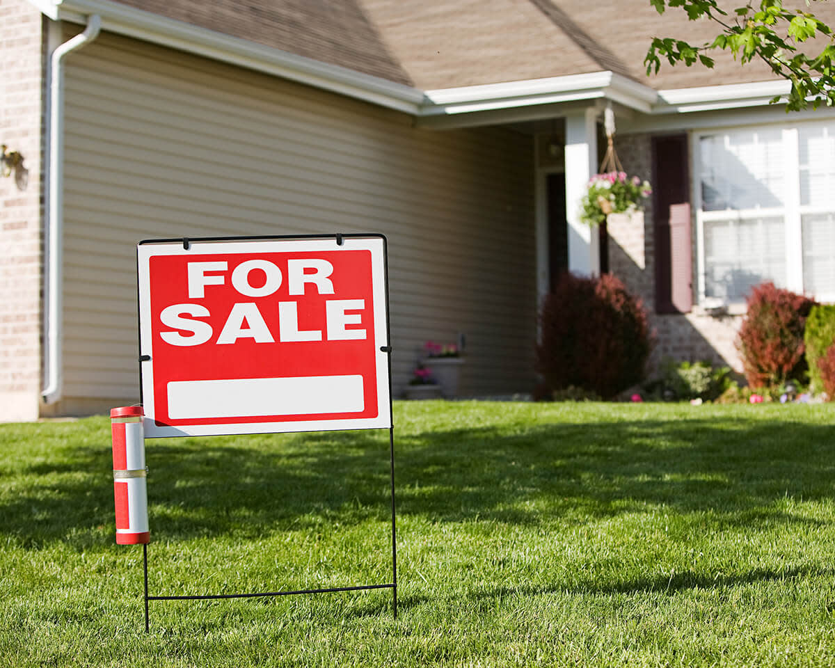 Sign in Front of Home