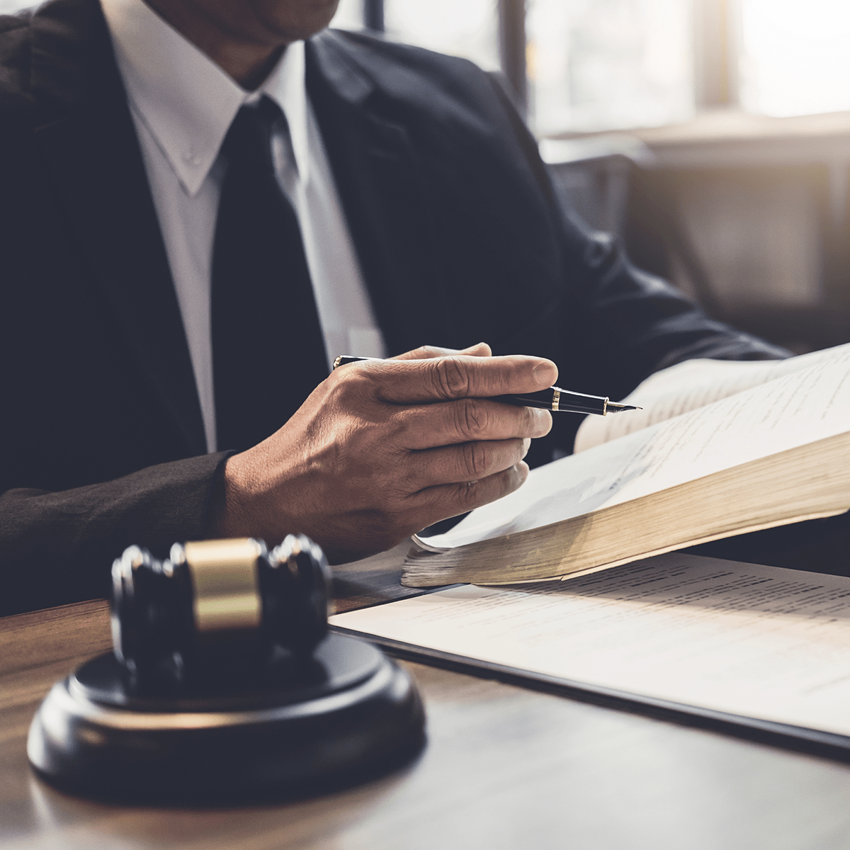 Businesswoman and Male lawyer or judge consult having team meeting with client, Law and Legal services concept