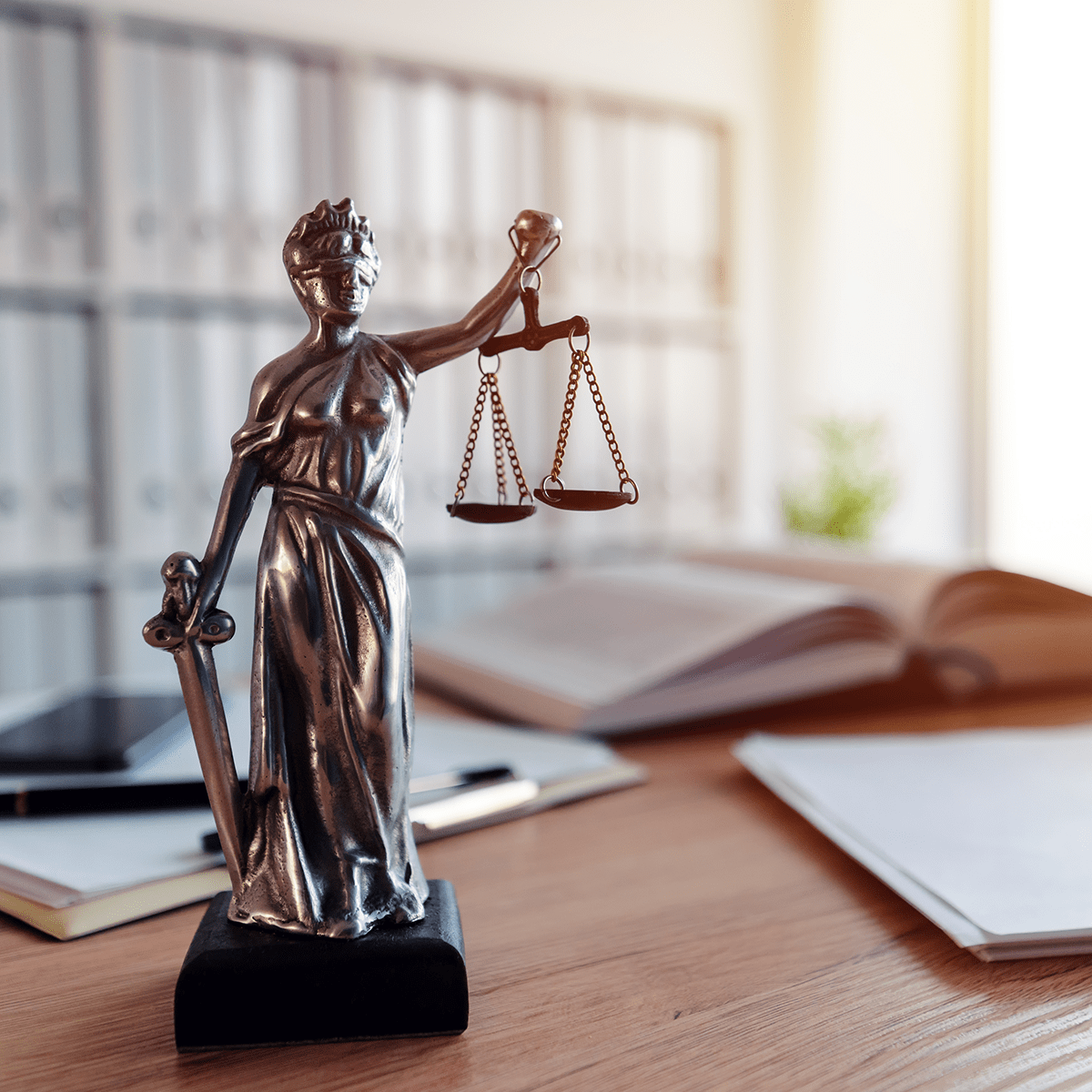 Lady Justice statue in law firm office