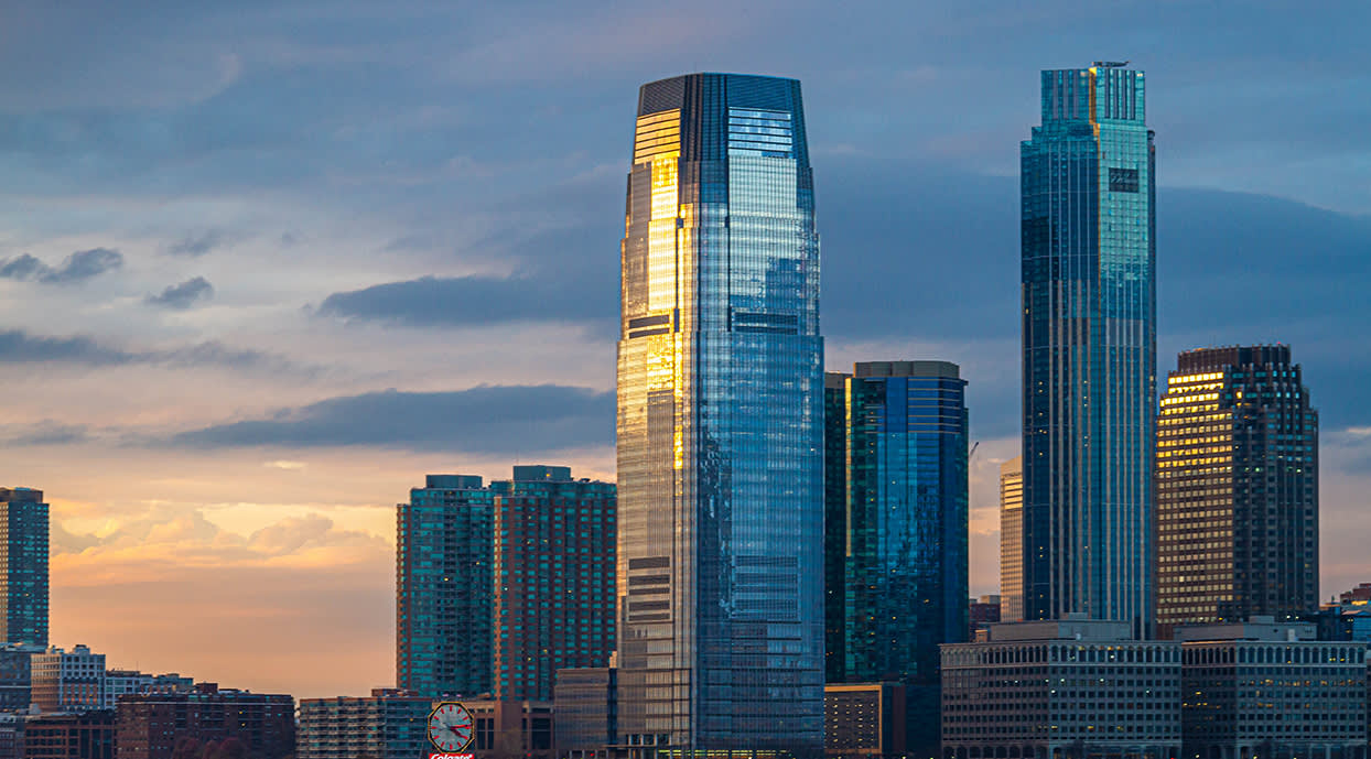 Evening image of the skyline of Jersey City in the state of New Jersey during sunset.