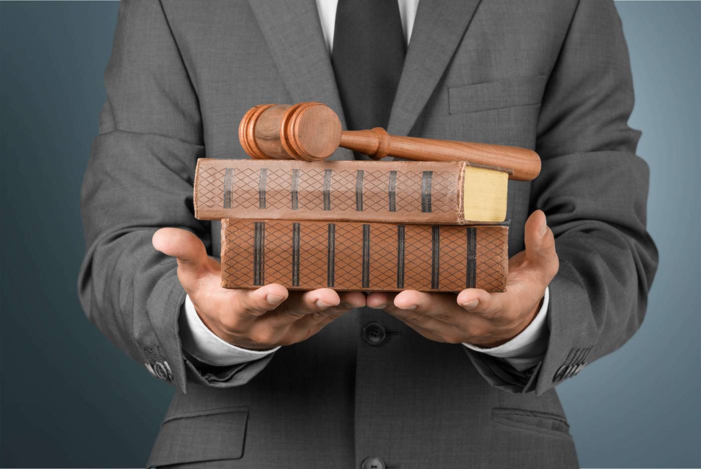 Man with books and gavel