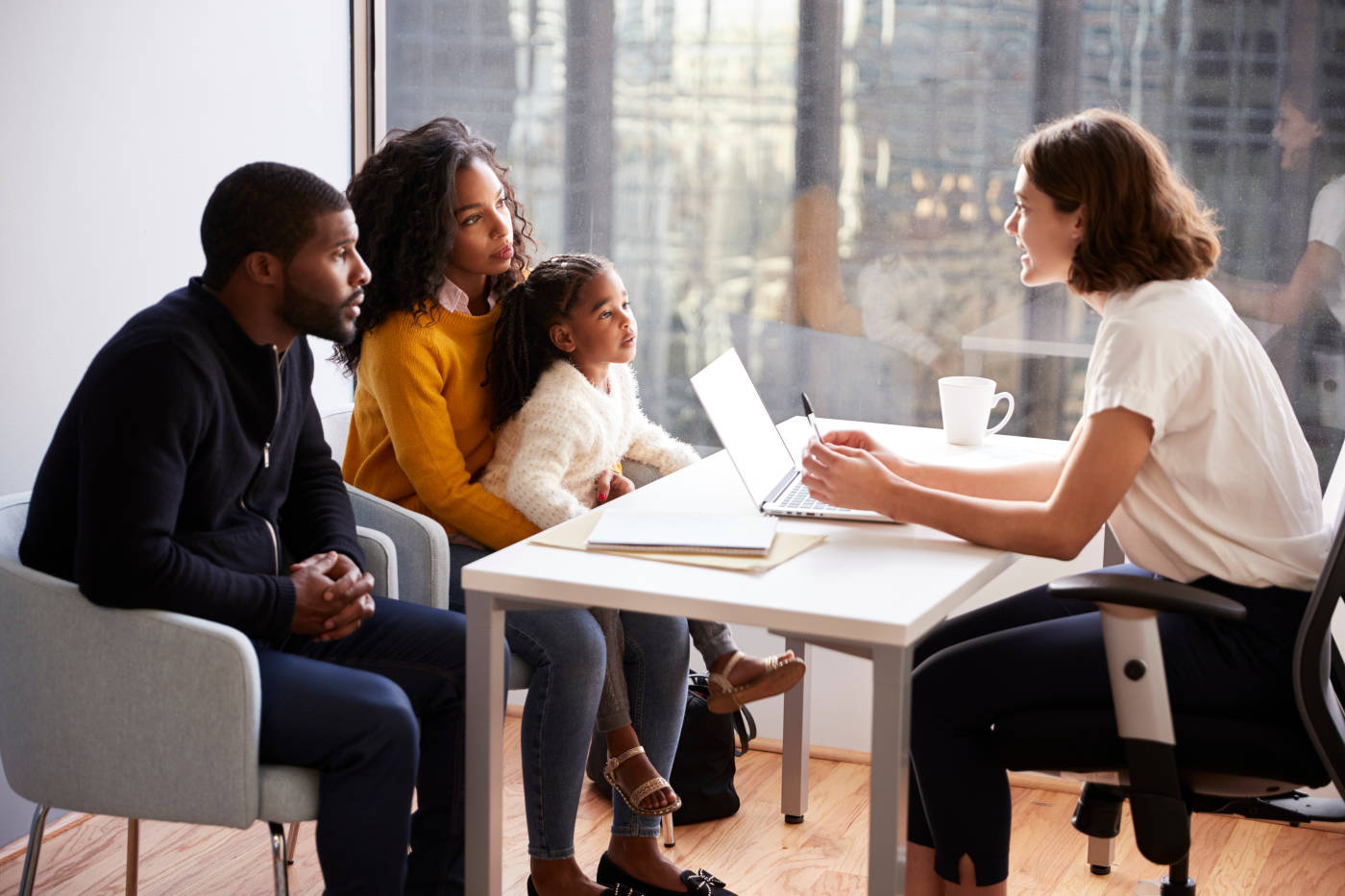 Parents consulting with professional