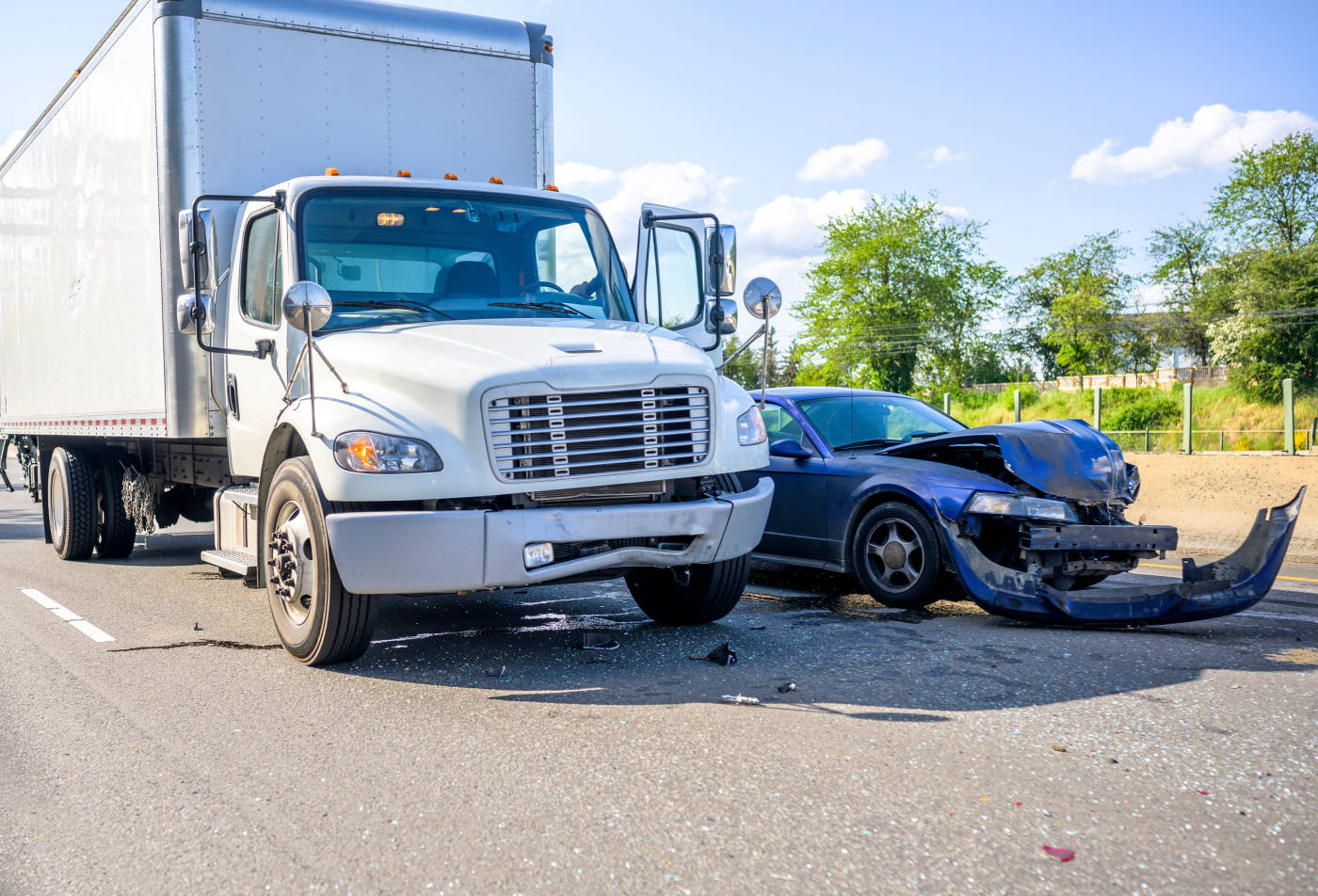 Truck and Car collide on highway