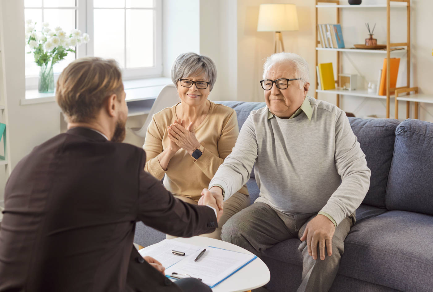 Senior couples consulting with attorney