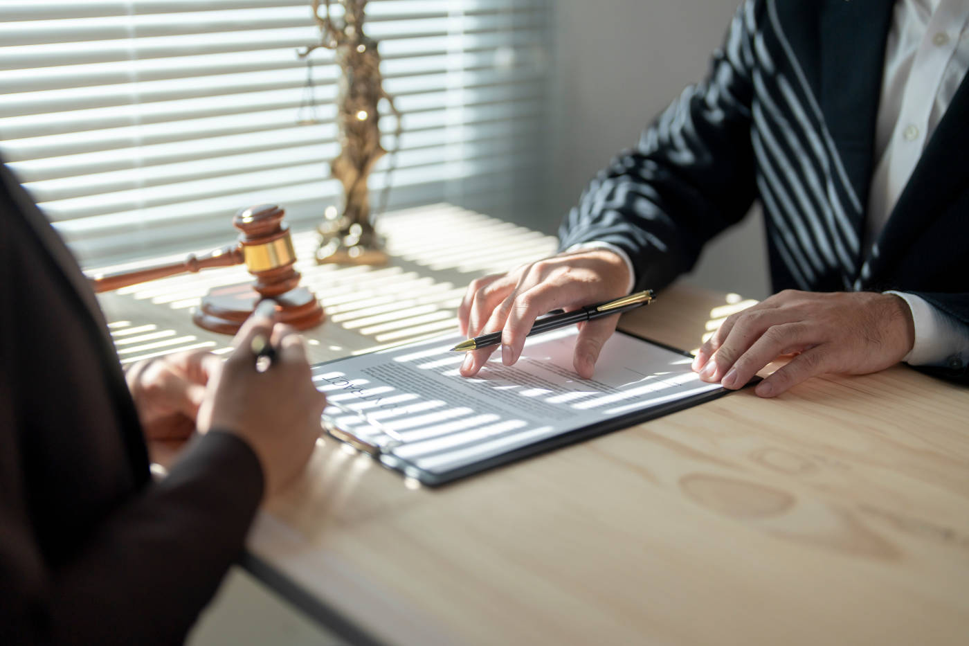 Businessman consulting with attorney