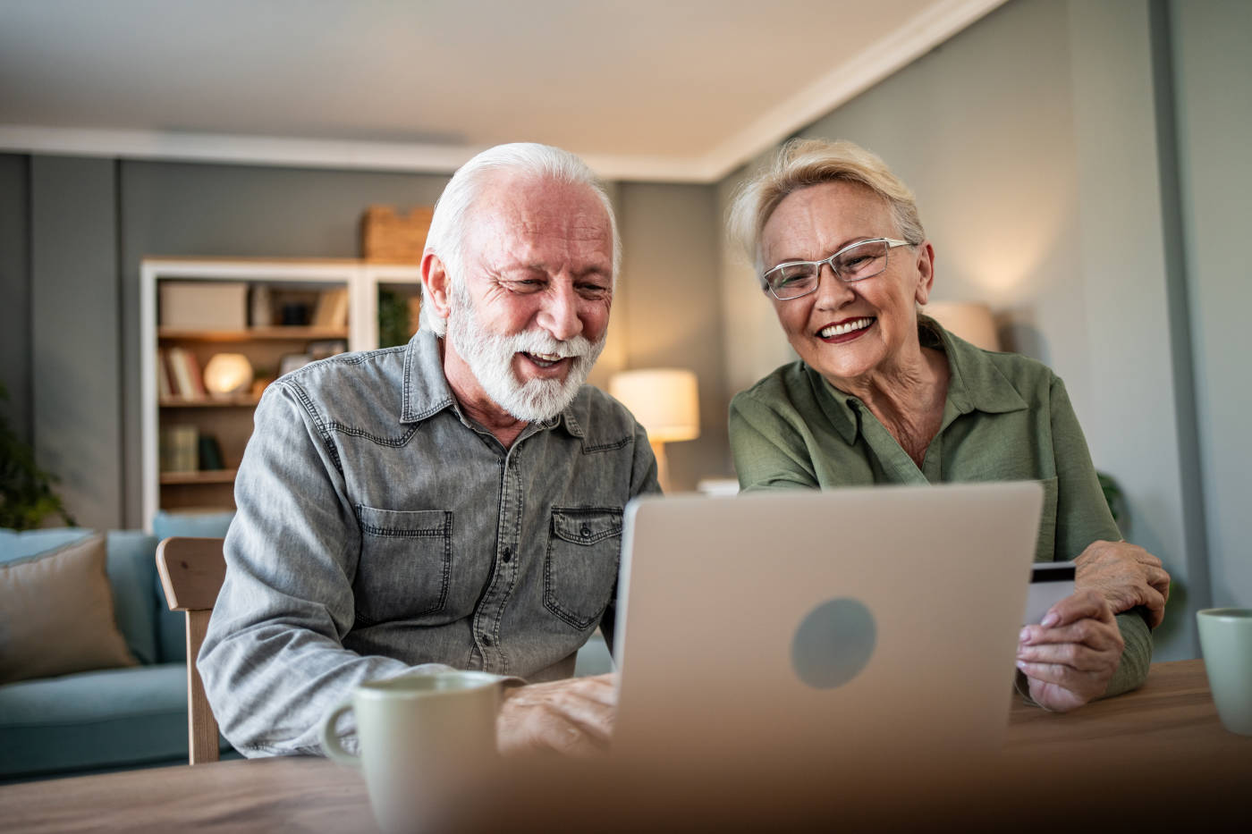Happy senior retired couple at home