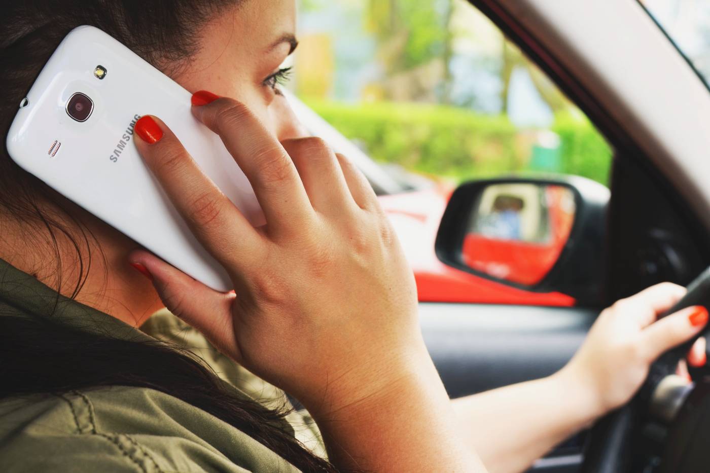 Woman on phone while driving